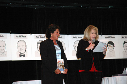 Kelly Lange Presents Award to Janet Goliger